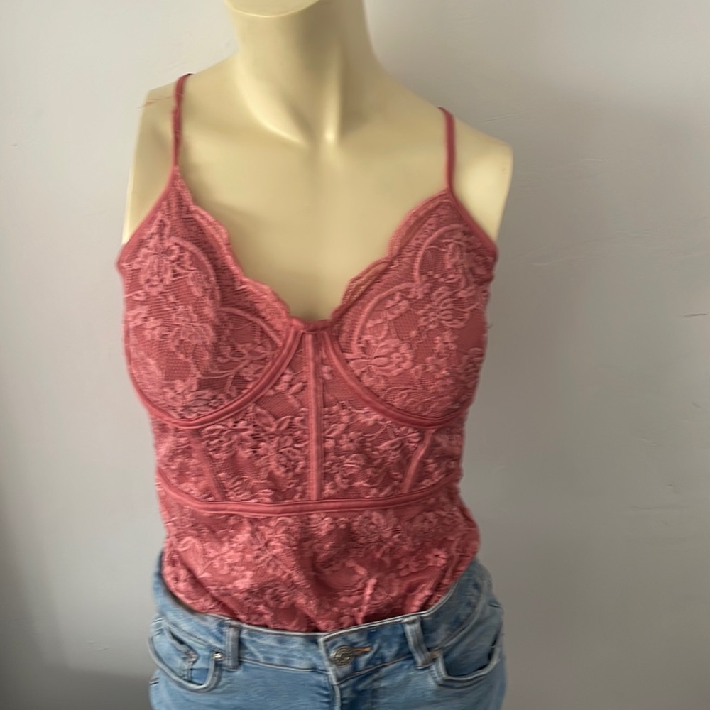 Pink lace body suit